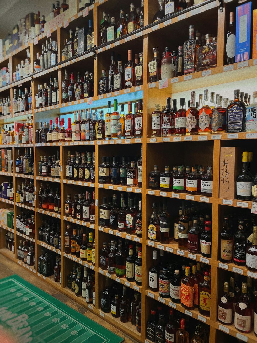 a store filled with lots of bottles of liquor