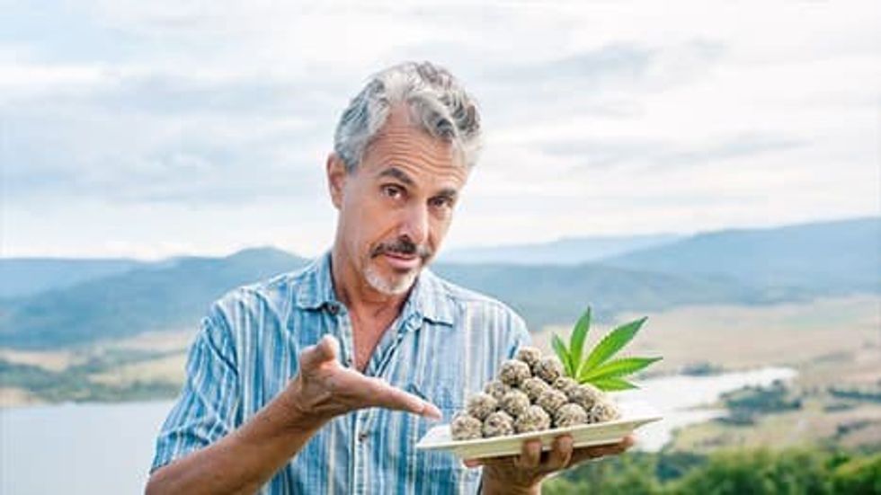 Chris poses with a plate of cannabis majoon balls.