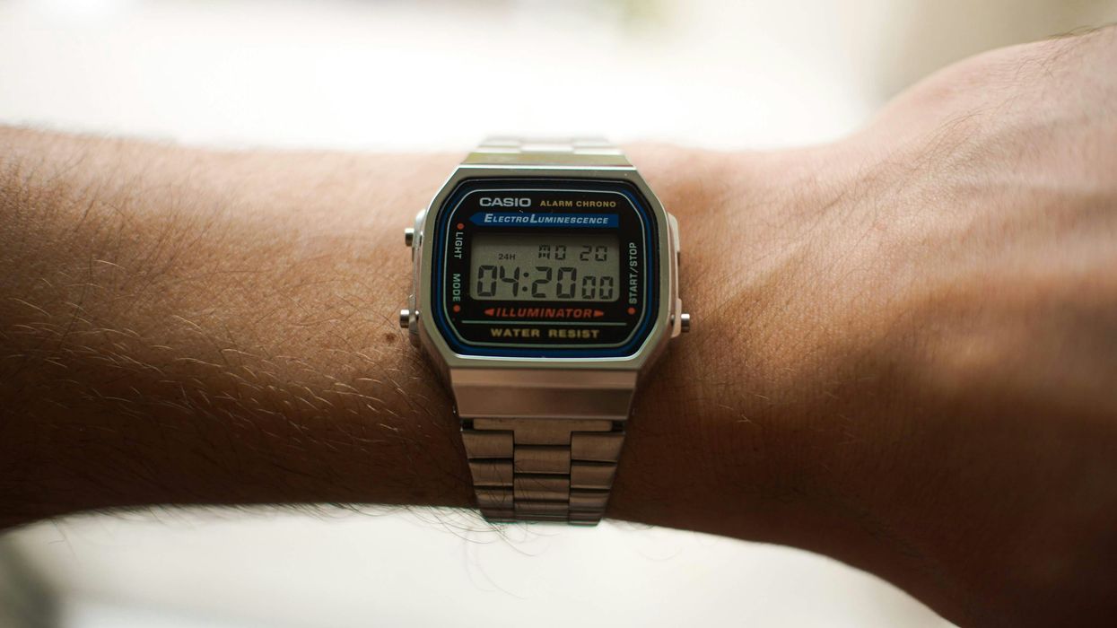 close up of a digital Casio wrist watch; digital wristwatch showing 4:20 as time