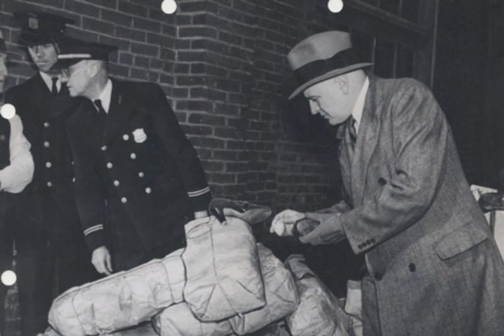 Harry Anslinger inspecting drug haul