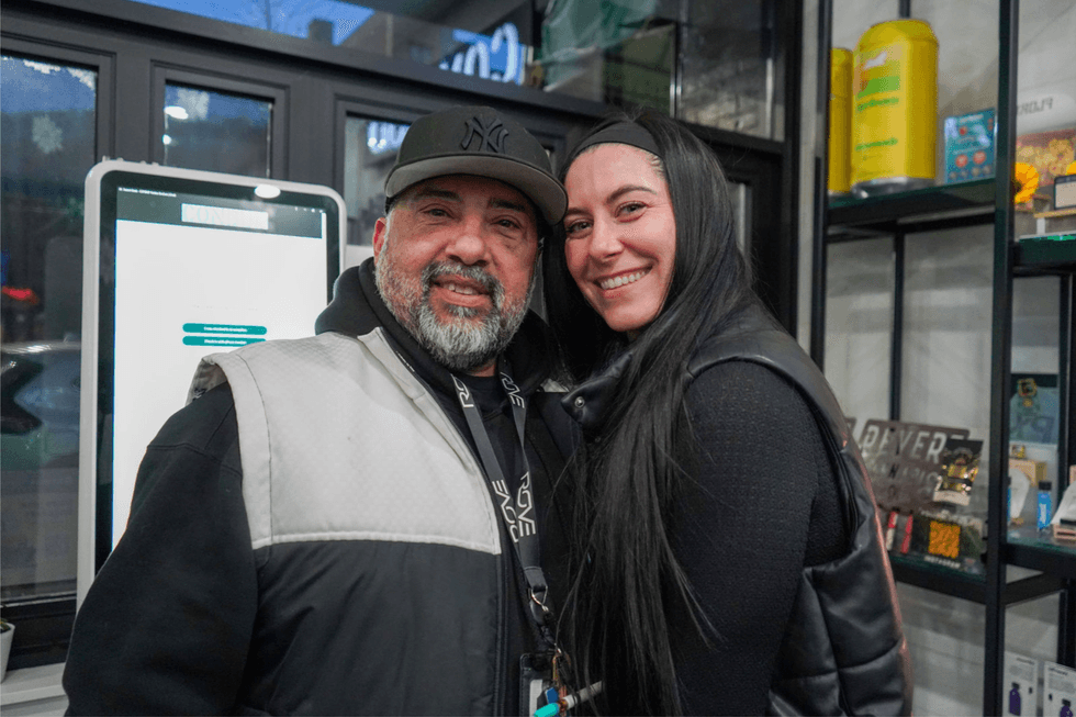 image of Mario Ramos of ConBud and Chelsea Buttner of PuffCards at grand opening of ConBud Yankee Stadium